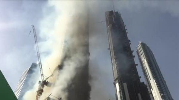 Raw: Crews battle blaze at Dubai skyscraper