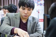 Minnetonka chess Grandmaster Wesley So made a move against 16-year-old Grandmaster Jeffery Xiong in their game Friday at the U.S. Chess Championship i