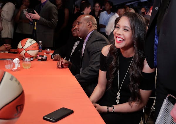 Nia Coffey reacts after being selected as the fifth overall pick in the WNBA basketball draft by the San Antonio Stars, Thursday, April 13, 2017, in N