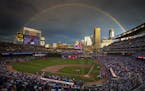 A rainbow shows over Target Field during the 2014 All-Star Game.