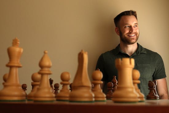 Premium Photo  Man playing chess against himself