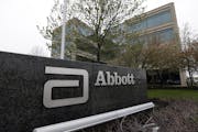 A sign at an Abbott Laboratories campus facility is seen in Lake Forest, Ill.
