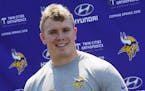 Minnesota Vikings rookie center Pat Elflein, out of Ohio State, takes questions from the media during the NFL football team's rookies minicamp Friday,