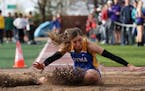 Anna Keefer of St. Michael-Albertville competed in the long jump Friday. ] ANTHONY SOUFFLE ï anthony.souffle@startribune.com Individuals competed dur
