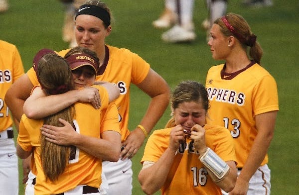 Shortstop Allie Arneson (16) and Gophers teammates agonized after Alabama defeated Minnesota 1-0 to end the Gophers' season in the championship game o