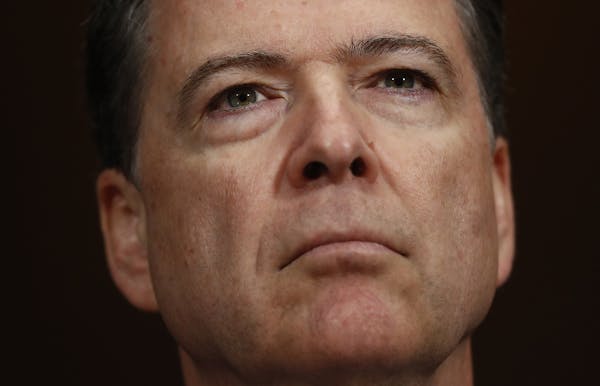 FILE- In this May 3, 2017, file photo, FBI Director James Comey listens on Capitol Hill in Washington. President Donald Trump has fired Comey. In a st
