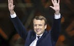 French President-elect Emmanuel Macron gestures during a victory celebration outside the Louvre museum in Paris, France, Sunday, May 7, 2017. Speaking