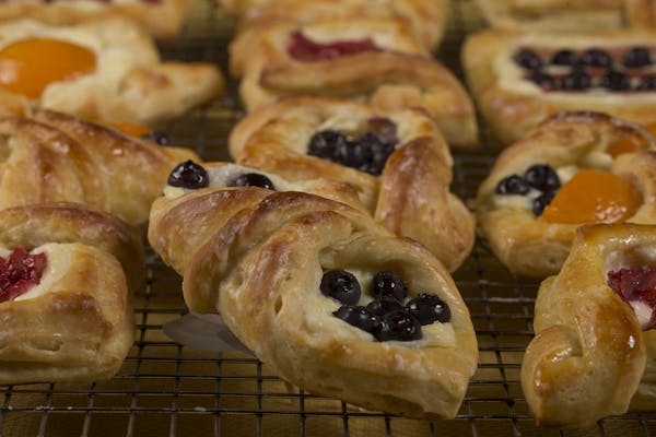 Danish pastries with lemon cream cheese filling and summer fruit.