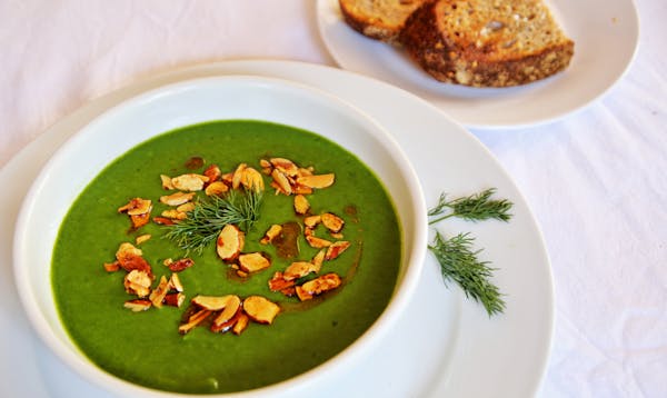 Creamy Spinach Soup with Dill and Paprika Almonds. ROBIN ASBELL • Special to the Star Tribune