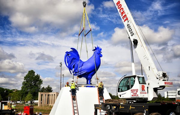 Walker Art Center installed Hahn/Cock by artist Katharina Fritsch, the ultramarine blue rooster that stands over 20 feet tall in the reconstructed Min