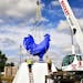 Walker Art Center installed Hahn/Cock by artist Katharina Fritsch, the ultramarine blue rooster that stands over 20 feet tall in the reconstructed Min