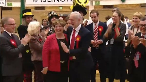 Up high? Too slow! UK leader's high-five ends in awkward thud