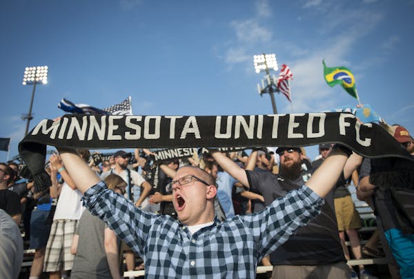 New home: Minnesota United FC fan David Martin of Prior Lake was part of a boisterous crowd last season in Blaine. The scene shifts to TCF Bank Stadiu