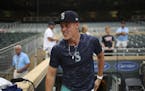 After changing into some Mariners gear, Burnsville's Sam Carlson spent time with the team before Tuesday's game at Target Field. (Jeff Wheeler, Star T