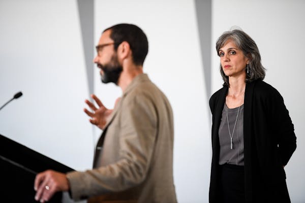Walker Art Center executive director Olga Viso, right, watched as artist Sam Durant spoke at a news conference on May 31.