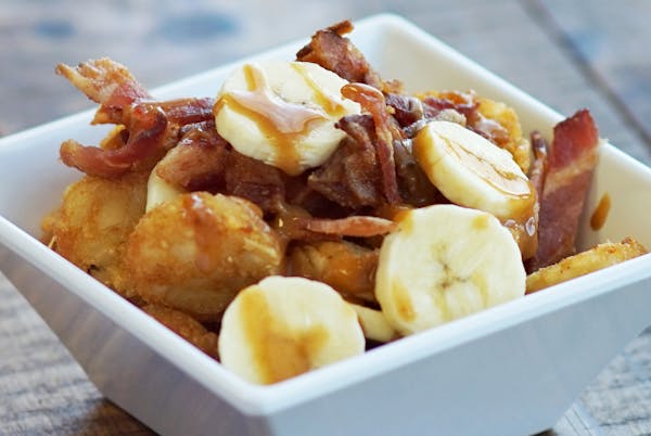 One of the new foods coming to the State Fair: Memphis Totchos (sliced bananas and sauteed bacon over tater tots, topped with peanut sauce) at Snack H