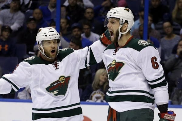 Jason Pominville (left) and Marco Scandella were traded by the Wild to Buffalo. AP Photo/Jeff Roberson