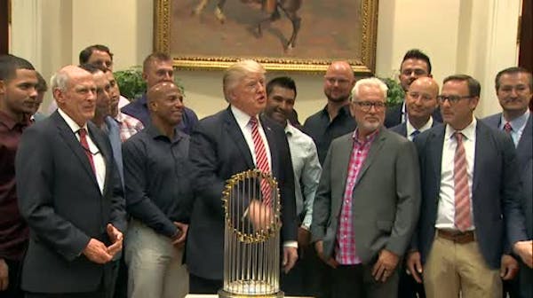 Trump welcomes Cubs, teases health care surprise