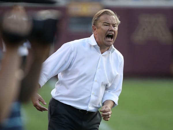 United FC coach Adrian Heath yelled instructions to his team Tuesday.