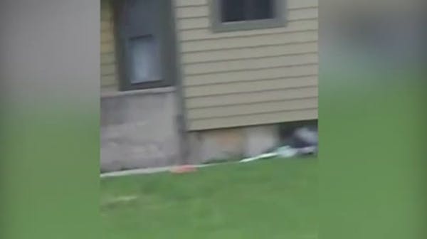 Woman caught on video setting Wis. home on fire