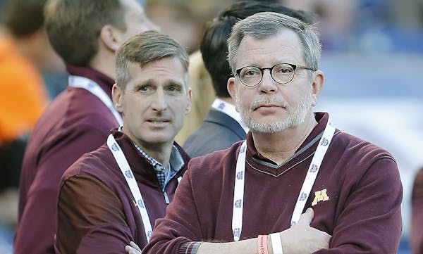 Mark Coyle and Eric Kaler at the Holiday Bowl in December.