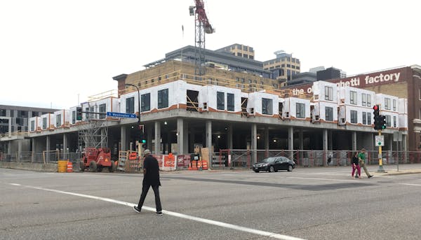 Sherman Associates and Frana Cos. started building a 180-unit apartment complex, with a Trader Joe’s store planned on street level, at Washington an