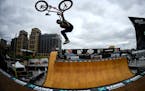 Extreme invasion: After performing a tail whip in practice, Jamie Bestwick went on to win silver in the BMX vert final.