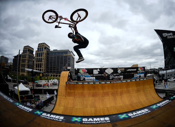 Extreme invasion: After performing a tail whip in practice, Jamie Bestwick went on to win silver in the BMX vert final.