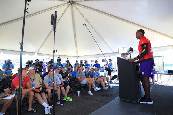 Minnesota Vikings quarterback Teddy Bridgewater speaks at his first press conference since his knee injury last year, during an NFL football training 