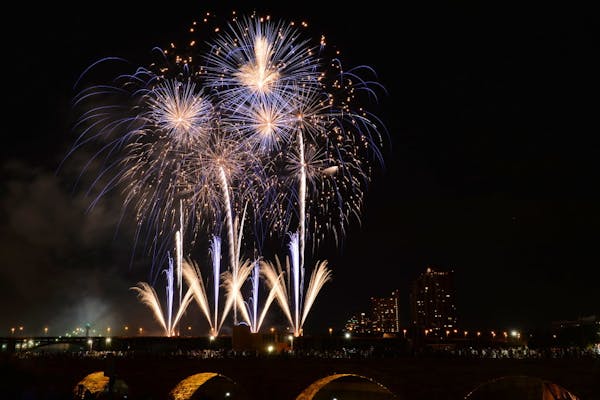 Fireworks exploded over the Stone Arch bridge in Minneapolis.
