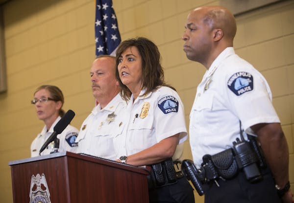 Minneapolis Police Chief Janeé Harteau spoke Thursday in Minneapolis, joined by, from left, inspector Kathy Waite, inspector Mike Kjos and Assistant 