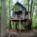 Magician Matt Dunn, whose home sits on three acres of wooded land, built a 400 plus square-foot deluxe, two-story treehouse that serves as his man-cav