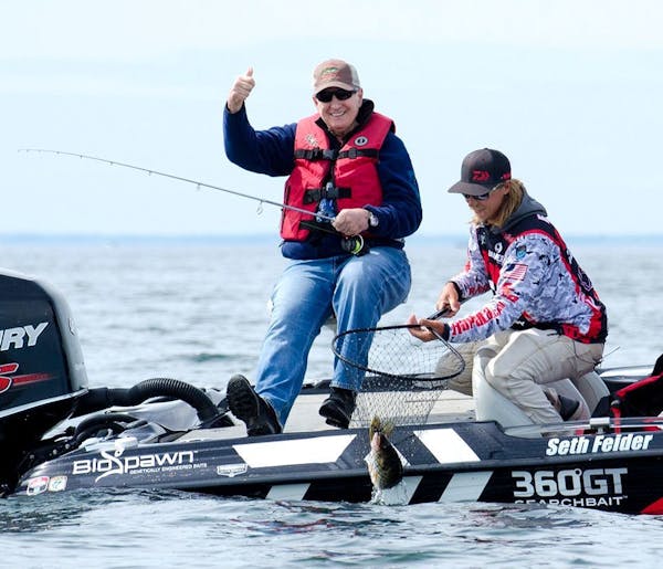 Gov. Mark Dayton, seen on Mille Lacs during the May 30 fishing opener, canceled a meeting with local business owners Saturday after 75 protesters in b