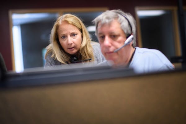 Crisis Connection manager and psychotherapist Laura Weber worked with a volunteer speaking to a caller who was in a mental health crisis. Crisis Conne