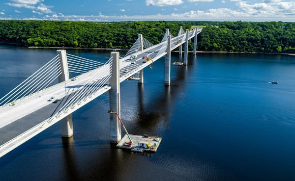 The nearly complete St. Croix River bridge connects the Minnesota and Wisconsin banks just south of Stillwater.