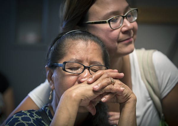 Elena Nava, who has lived in her south Minneapolis apartment for 13 years, became emotional after pleading her case along with supporter Natasha Villa