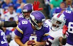Minnesota Vikings quarterback Sam Bradford (8) reacts before his is sacked by Buffalo Bills defensive end Jerry Hughes (55) during the first half of a