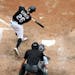 Chicago White Sox right fielder Avisail Garcia (26), singles against the Minnesota Twins, during the fifth inning of game one of a baseball double hea