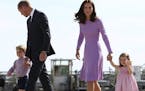 FILE - In this Friday, July 21, 2017 file photo Britain's Prince William, second left, and his wife Kate, the Duchess of Cambridge, second right, and 