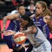 Lynx center Sylvia Fowles, who had 14 points and 10 rebounds, drove past Phoenix’s Brittney Griner on Tuesday at Xcel Energy Center.