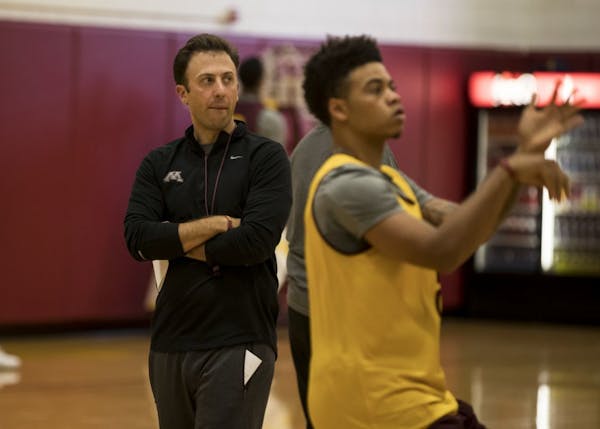 Gophers basketball coach Richard Pitino watched guard Nate Mason shoot during an October 2016 practice.