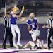 Cretin-Derham Hall's Peter Udoibok (3) celebrated his last minute touchdown with teammate Zach McDonnell (9), at left, in the end of the first half of