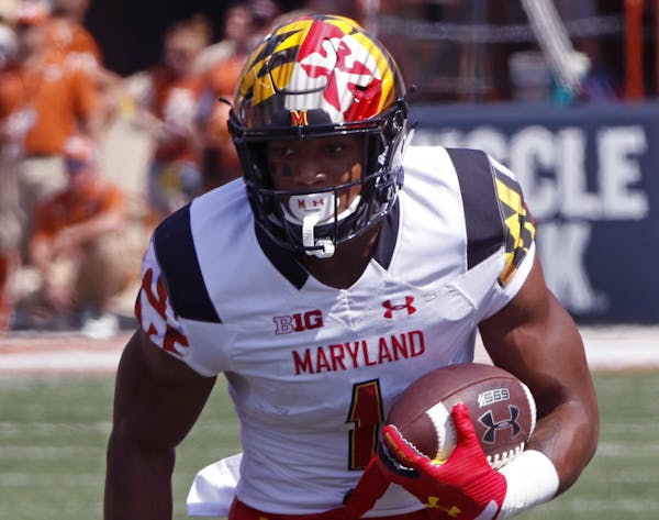 Maryland receiver D.J. Moore runs the ball after a catch during the first half of an NCAA college football game against Texas, Saturday, Sept. 2, 2017