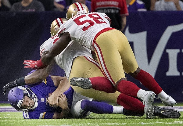 Vikings quarterback Sam Bradford recovered a fumble in the first quarter, among the many miscues the team committed Sunday night against the Niners.