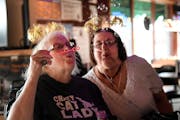 At Mortimer’s at Lyndale and Franklin in Minneapolis, Darlene Rasmussen, left, a customer of 35 years, and Donna Hatton, 20 years, celebrated a frie