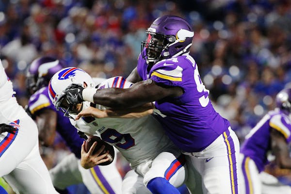 Vikings defensive tackle Jaleel Johnson sacked Bills quarterback T.J. Yates in the preseason opener Aug. 10. Johnson had five tackles on running plays