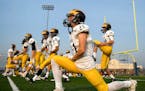 Rosemount players stretched before Thursday night's game against Wayzata. ] AARON LAVINSKY ï aaron.lavinsky@startribune.com Wayzata played Rosemount 