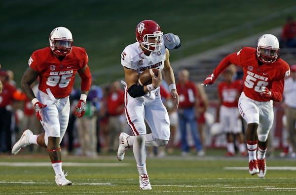 South Dakota quarterback Chris Streveler had 31 total touchdowns last season. (AP Photo/Andres Leighton)