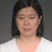 Lili Huang, 36, was sentenced Thursday to 12 months and one day in jail, and ordered her to forfeit her home by Senior U.S. District Judge David Doty.