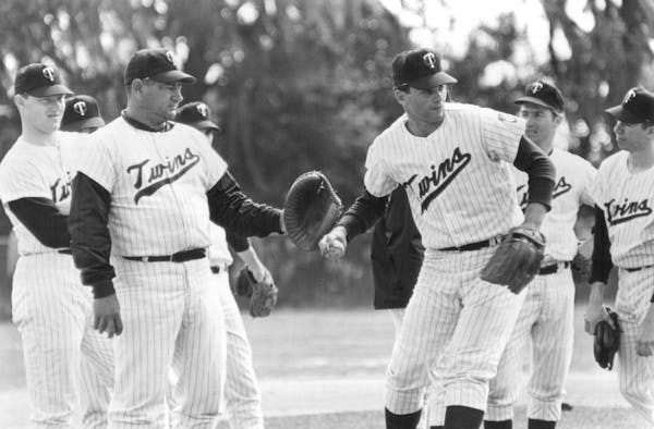March 21, 1967: Pitching coach Early Wynn, second from left, worked with Jerry Crider. Jim Kaat, left, and Dave Boswell watched
